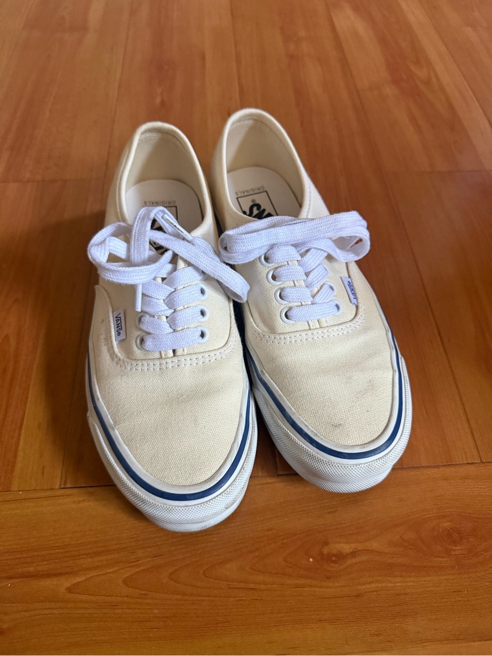 Vans Cream Canvas Sneakers with Blue Accent